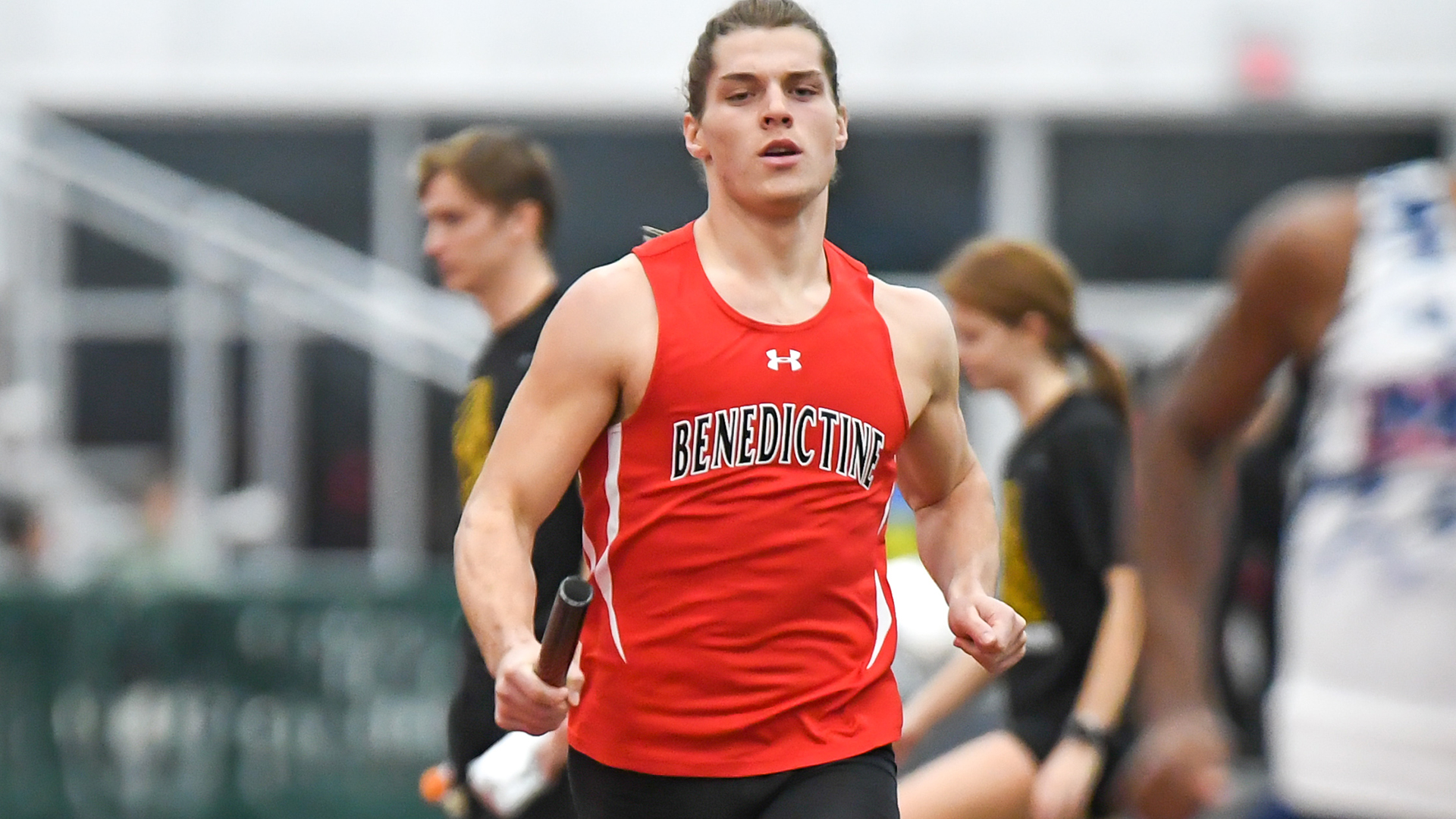 Men's Indoor Track  hit three NAIA standard times at KU, Pitt State